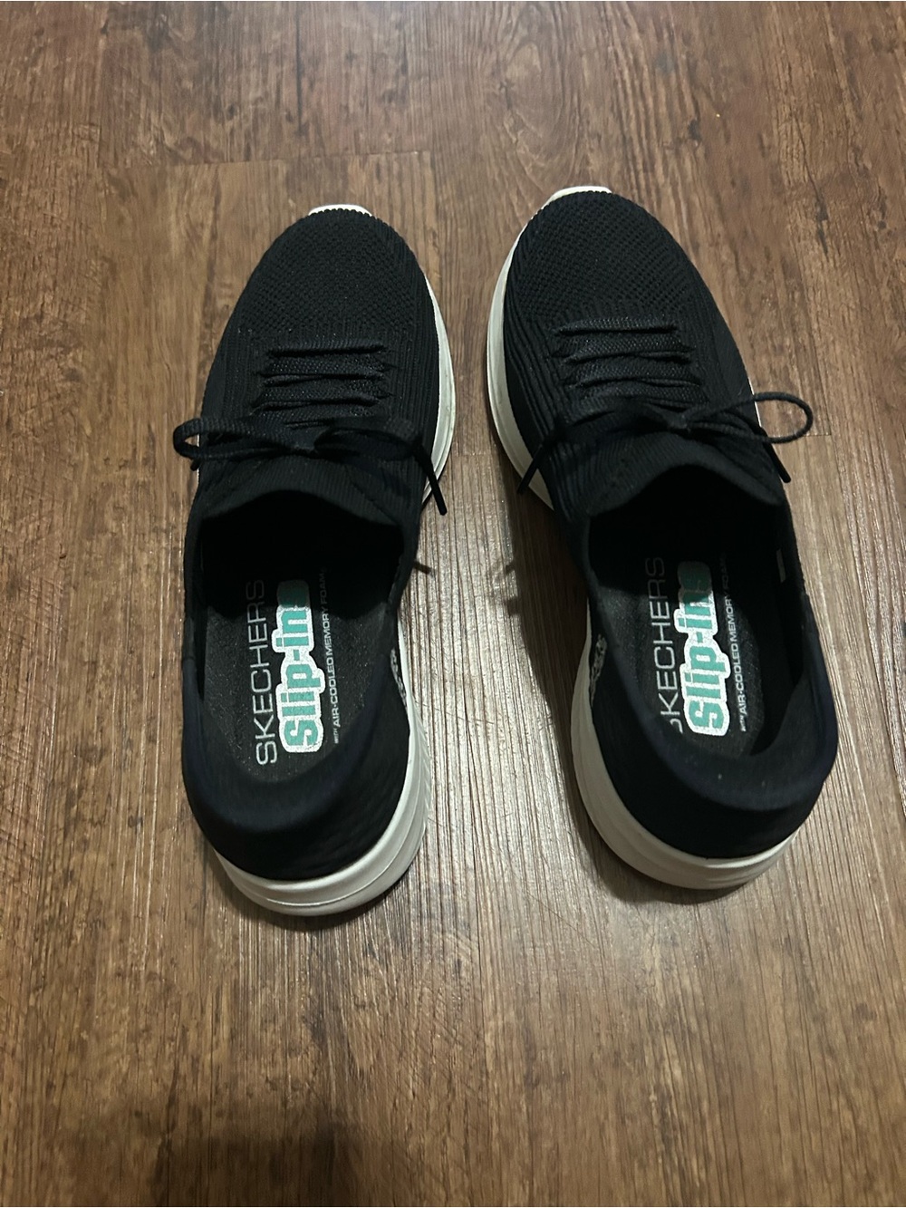 Skechers  Black Knit Slip-On Sneakers with White Sole